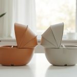 Nuna Rava and UPPAbaby Knox convertible car seats compared side by side in a bright living room