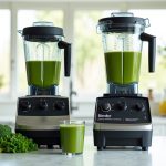 Vitamix A3500 and Blendtec Designer 725 blenders with a green smoothie